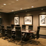 A conference room with chairs and tables in it