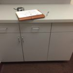 A note book sitting on top of a counter.