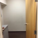 A door way leading to the bathroom.