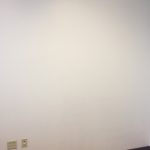 A white wall with no one in it