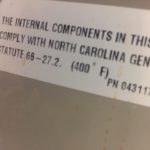 A sign that says the internal components in this room comply with north carolina general statute 6 5-2 7. 2.