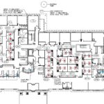 A floor plan of an office building with many cubicles.